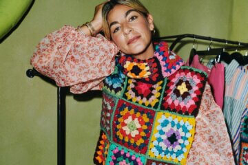 Designer of brand Mochi wearing her colorful fashion